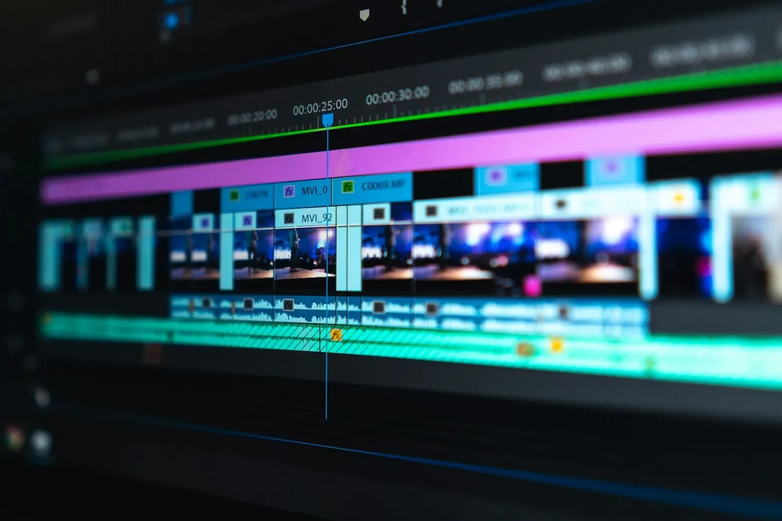 Real editing workstation with a multitrack video timeline displayed on screen
